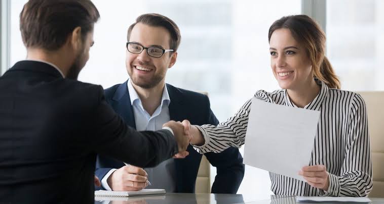Team of professionals in a business meeting discussing workforce planning